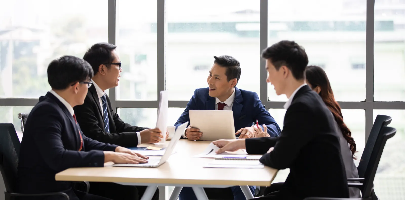 Business team meeting around a conference table